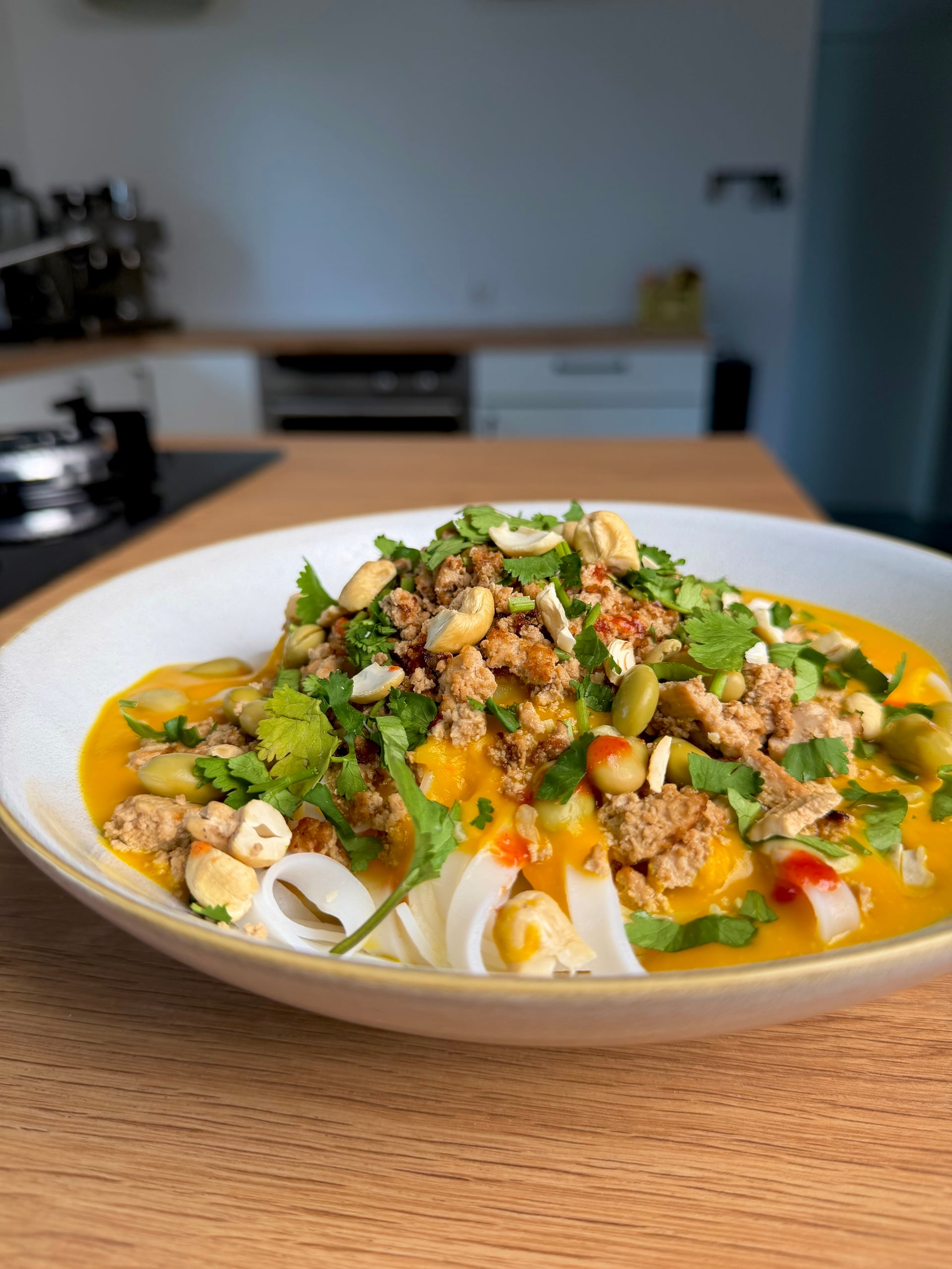 Reisbandnudeln mit Kokos-Kürbis-Sauce - Rezeptbild